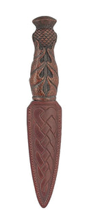Stylish Thistle Daywear Sgian Dubh with black resin handle and real blade displayed elegantly.