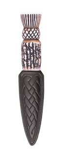 Thistle Imitation Staghorn Sgian Dubh featuring a resin handle and stainless steel blade, displayed in a stylish black leather sheath, perfect for daywear.
