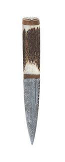 Close-up view of the Staghorn Damascus Blade of the Sgian Dubh, highlighting intricate patterns and the walnut handle.