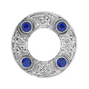 Lifestyle image of Dancers Celtic Plaid Brooch worn on clothing, illustrating its charm as a conversation starter.