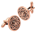 Close-up view of the Celtic Shield Copper Cufflinks showcasing intricate design and polished finish.