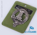 Malcolm Clan Crest Badge in Pewter featuring a luxurious palladium finish, ideal for showcasing Scottish heritage as a cap badge or brooch pin.